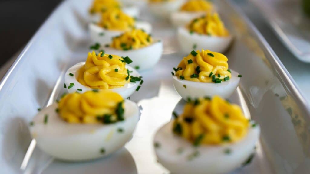 white and yellow icing covered cupcakes